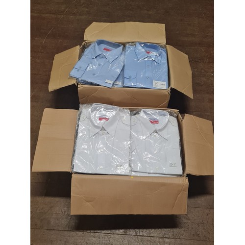 6 - 2 boxes of new work shirts.