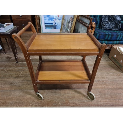 39 - Vintage wooden serving trolley with removable trays on casters.