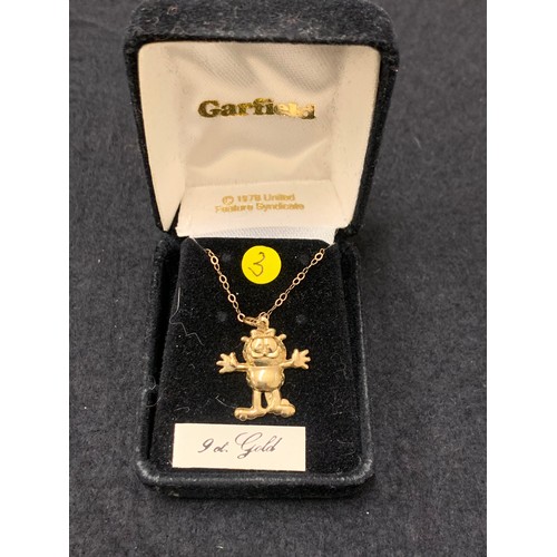 191 - 9ct gold chain with gold Garfield pendant.