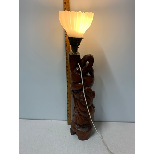 74 - Large carved Asian lamp with glass flower shade.
71cm h inc shade