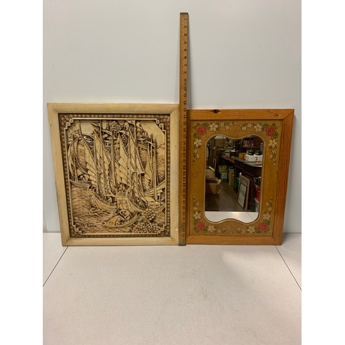 82 - Hand carved Asian wall hanging depicting shipping scene along with wood framed mirror.
largest 60cm ... 