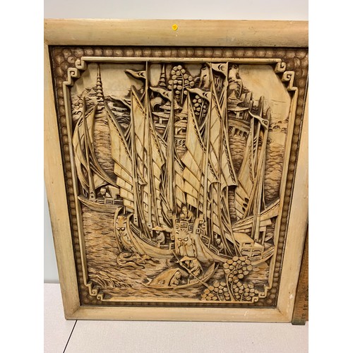 82 - Hand carved Asian wall hanging depicting shipping scene along with wood framed mirror.
largest 60cm ... 