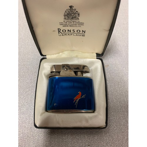 109 - Vintage blue enamel Ronson lighter with red bird. In original box.