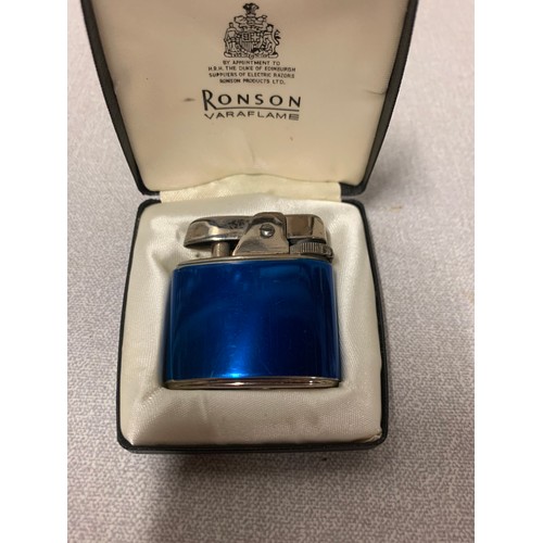 109 - Vintage blue enamel Ronson lighter with red bird. In original box.