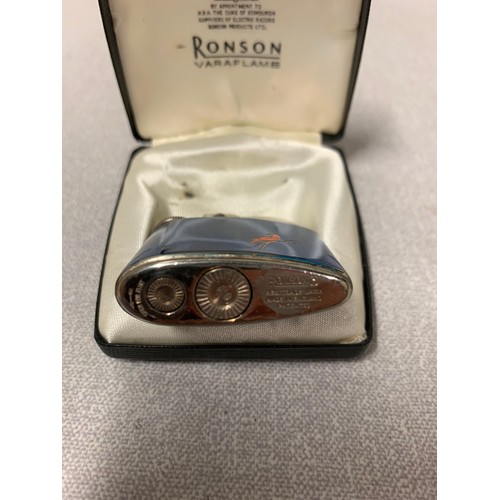 109 - Vintage blue enamel Ronson lighter with red bird. In original box.