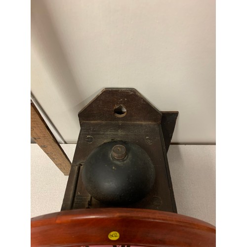 117 - Vintage wood framed wall clock with enamel and brass face - with weights and pendulum.