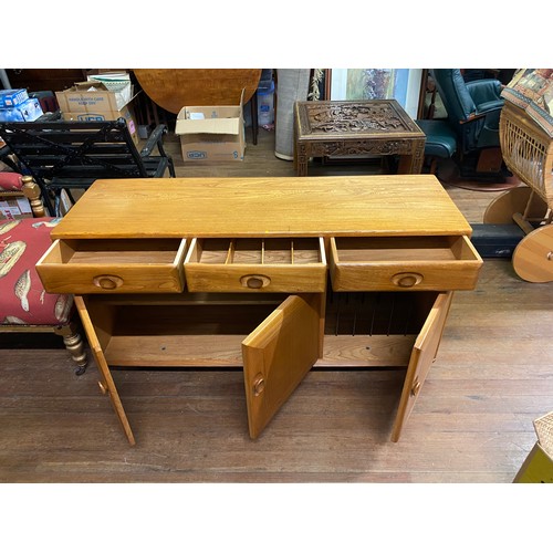 151 - Ercol solid elm Windsor sideboard.
136cm x 43cm x 69cm