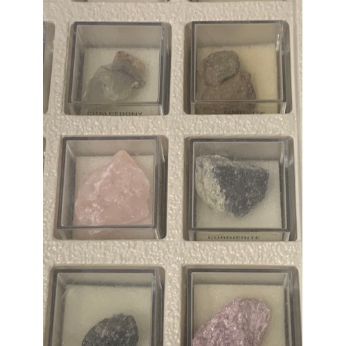 155A - Collection of semi precious stones in display cases along with salt lamp.