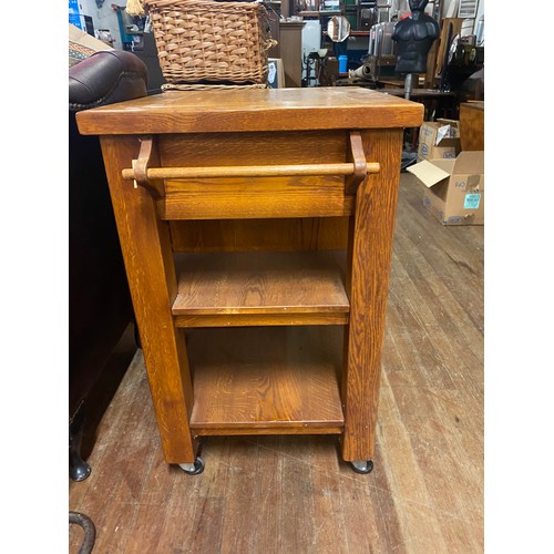 169 - Solid wood kitchen island on casters.
98cm high x 70cm x 60cm