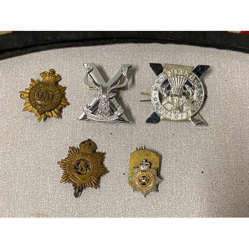 175A - 3 glengarry caps along with buttons and cap badges.