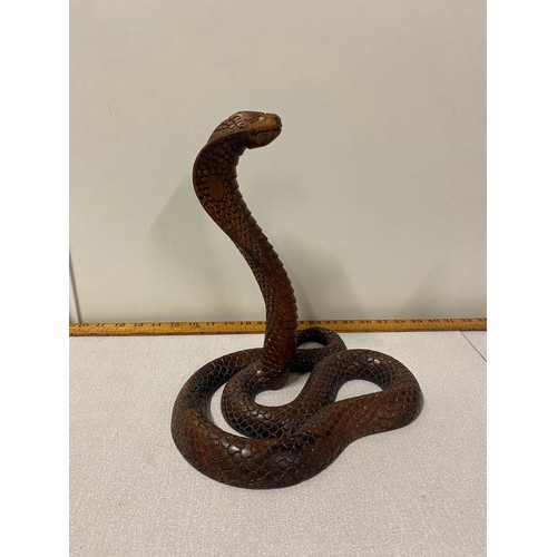 3 - Carved wooden cobra sculpture.
30cm h