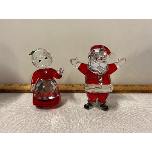 8 - Mr and Mrs Claus Swarovski crystal figures with original boxes.