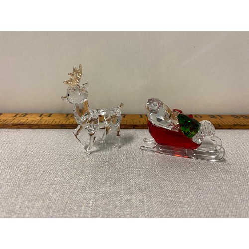 11 - Swarovski crystal Reindeer (with box) and Swarovski crystal sleigh.