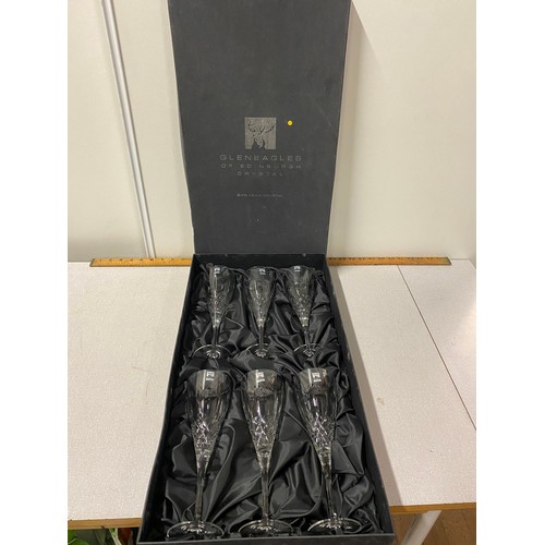 40 - Set of 6 Gleneagles of Edinburgh crystal champagne flutes in fitted box.