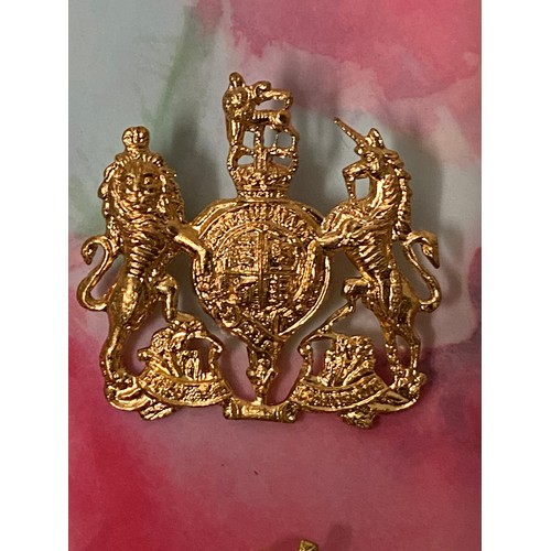 86 - 34 British military cap badges.