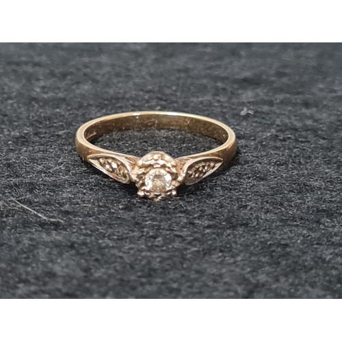 61 - 9ct gold and Illusion set diamond ring.