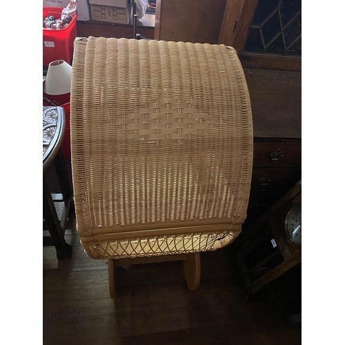 25 - Wicker dolls pram/moses basket with solid wood wheels. 95cm x 117 high