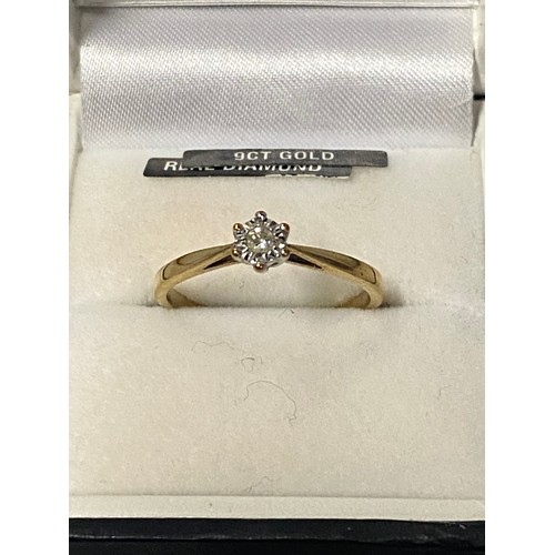 60 - 9ct gold and diamond solitaire ring.