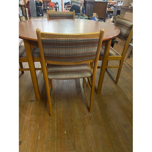 191 - Mid century Teak table with 4 matching chairs.