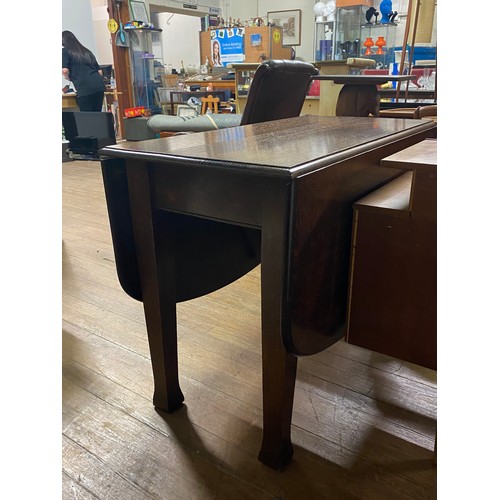 331 - Vintage solid wood drop leaf table.