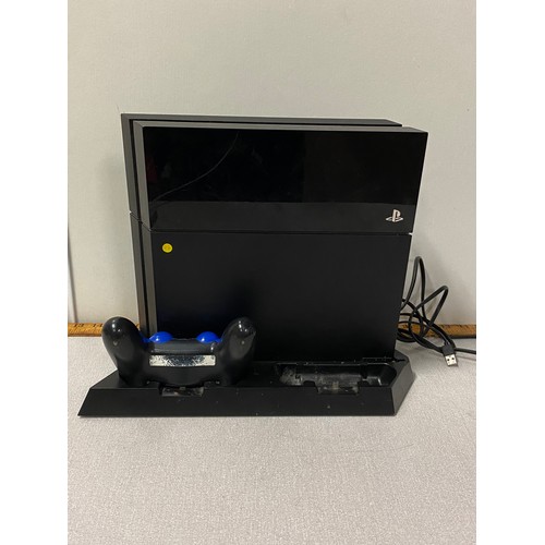 18 - Play Station 4 console with 1 controller.