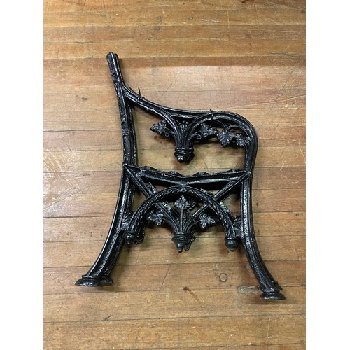 19 - Pair of vintage cast iron bench ends.