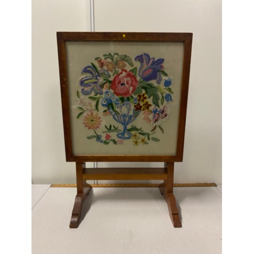 22 - Antique folding table/fire screen decorated with embroidered flowers to include poppy. Made for the ... 