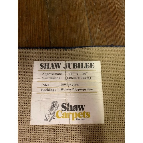 223 - Vintage Shaw 1977 Queens Silver Jubilee floor rug with original label. 142cm x 76cm.