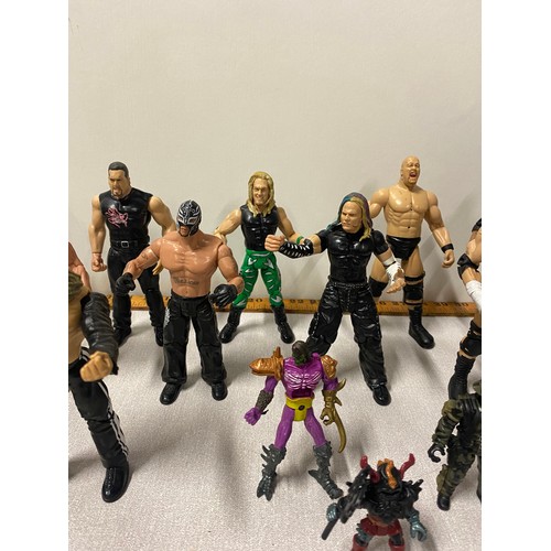 189 - Collection of vintage wrestling figures to include The Rock etc.