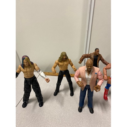 189 - Collection of vintage wrestling figures to include The Rock etc.