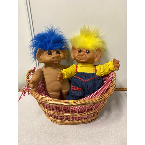 30 - 2 large troll dolls and wicker basket.