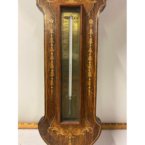 34 - Vintage inlaid wood and brass barometer.
76cm l