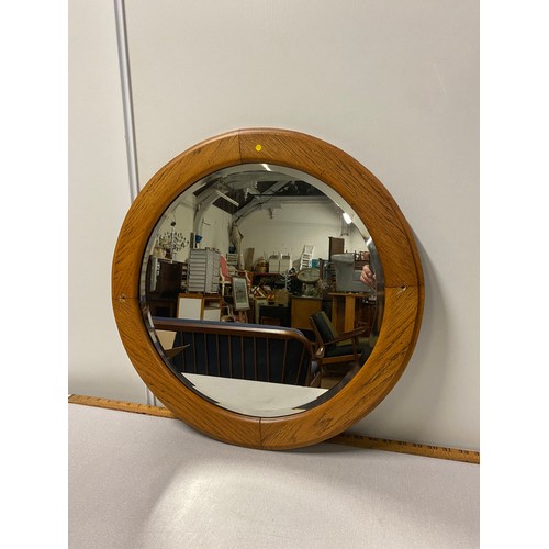 53 - Vintage round teak framed mirror. 57cm diameter