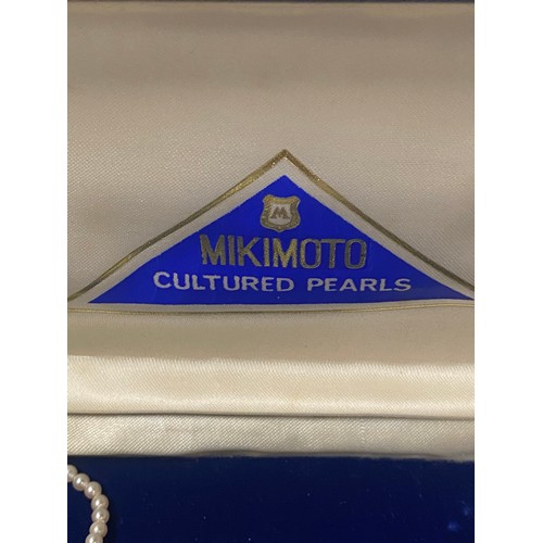 119 - Set of Mikimoto cultured pearls. with box and guarantee.