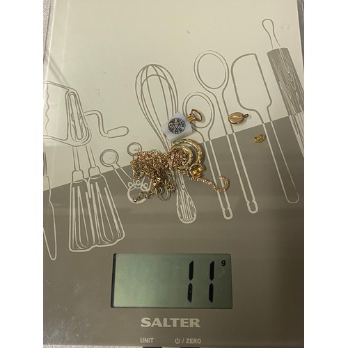 132 - 11grams of unmarked scrap gold some 9ct some 14ct.