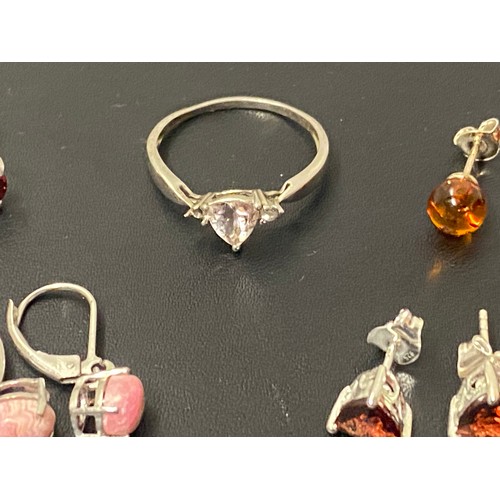 270 - 4 pairs of silver and gem set earrings along with silver ring.