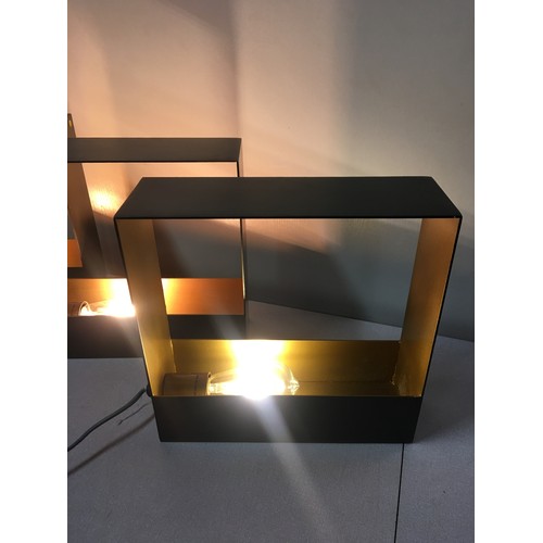 2 - 3 abstract metal box lamps with Edison bulbs.
30cm x 30cm