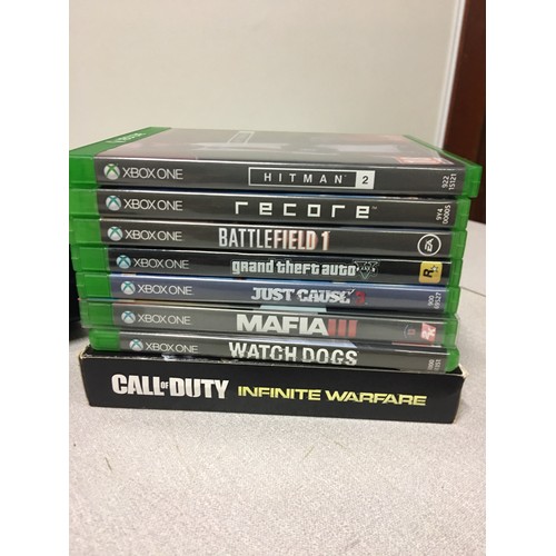 202 - X-Box one console with controller and 8 games to include call of duty.