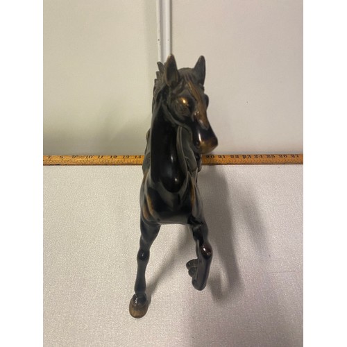 16 - Heavy bronze galloping horse statue.
30cm l x 28cm h