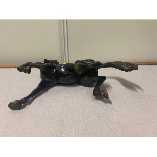 16 - Heavy bronze galloping horse statue.
30cm l x 28cm h