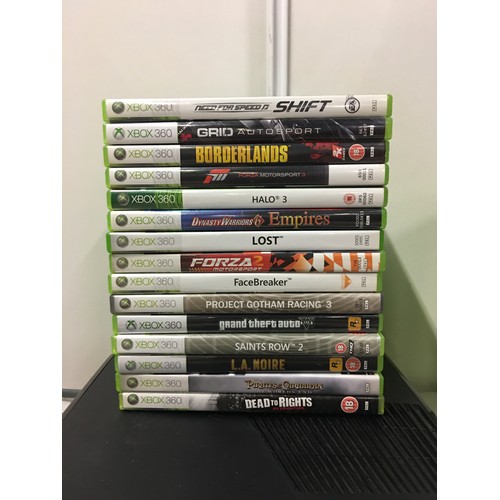 39 - X Box 360 and controller along with 30 games.