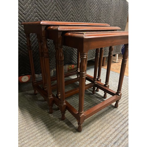 47 - Vintage brass inlaid nest of glass topped tables.