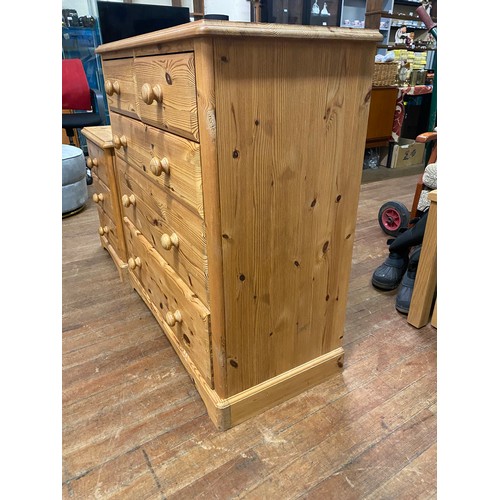 138 - Solid pine 5 drawer chest along with matching bedside cabinet.