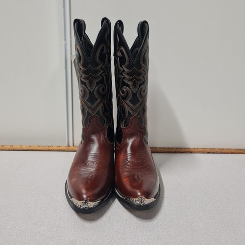 73 - New pair of leather Cowboy boots with metal detailing. Size 9.5
RRP £199.99