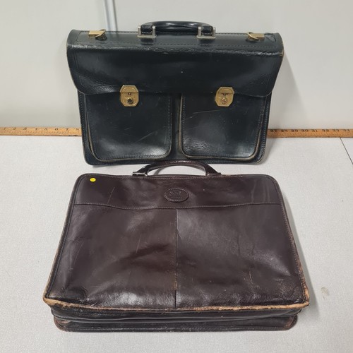 184 - 2 vintage leather briefcases.