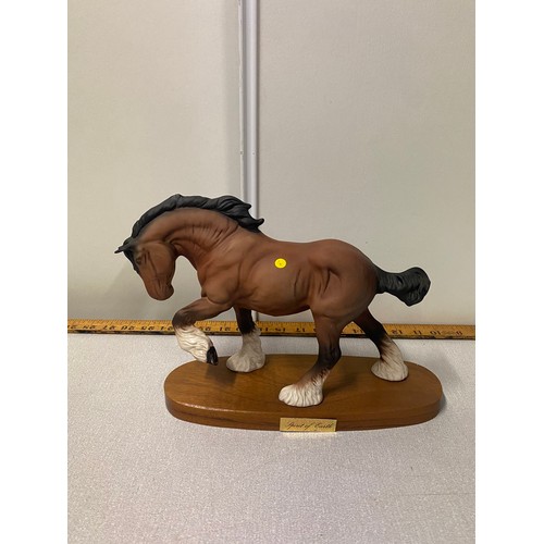 124 - Large Beswick Clydesdale horse on wooden stand 