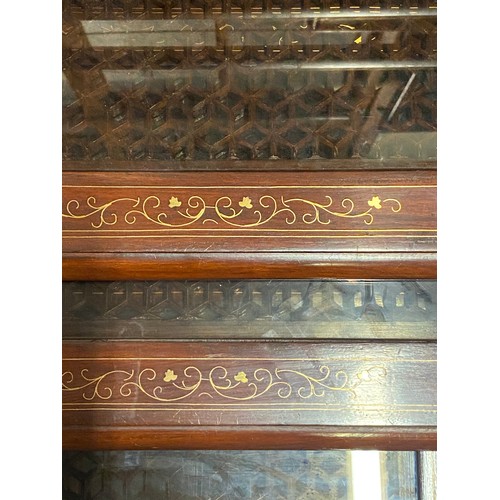 180 - Vintage brass inlaid nest of glass topped tables.