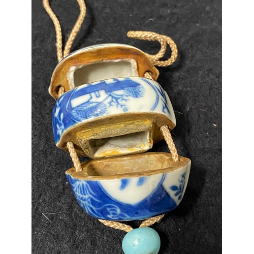 187 - Japanese hand painted blue and white Inro box suspended from an obi. To be worn around the waist whe... 