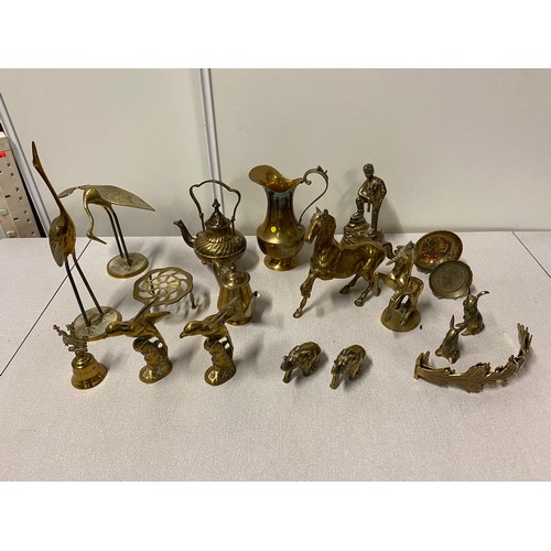 12 - Large collection of brass items to include horse and storks etc.