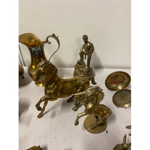 12 - Large collection of brass items to include horse and storks etc.